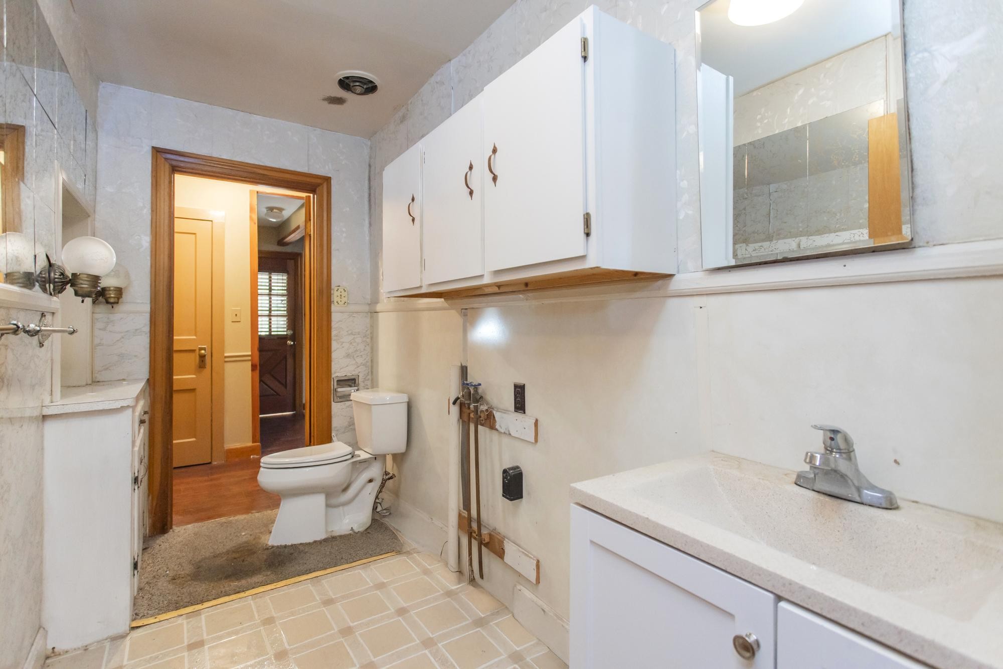 1700 Riverside Road Old Hickory, TN 37138 - Photo 16 of 59 a bathroom with a sink toilet and shower
