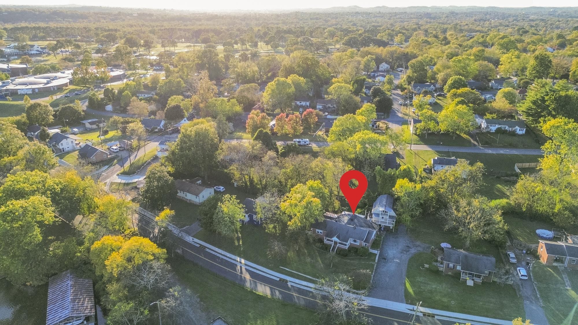 1700 Riverside Road Old Hickory, TN 37138 - Photo 46 of 59 an aerial view of residential houses with outdoor space and swimming pool