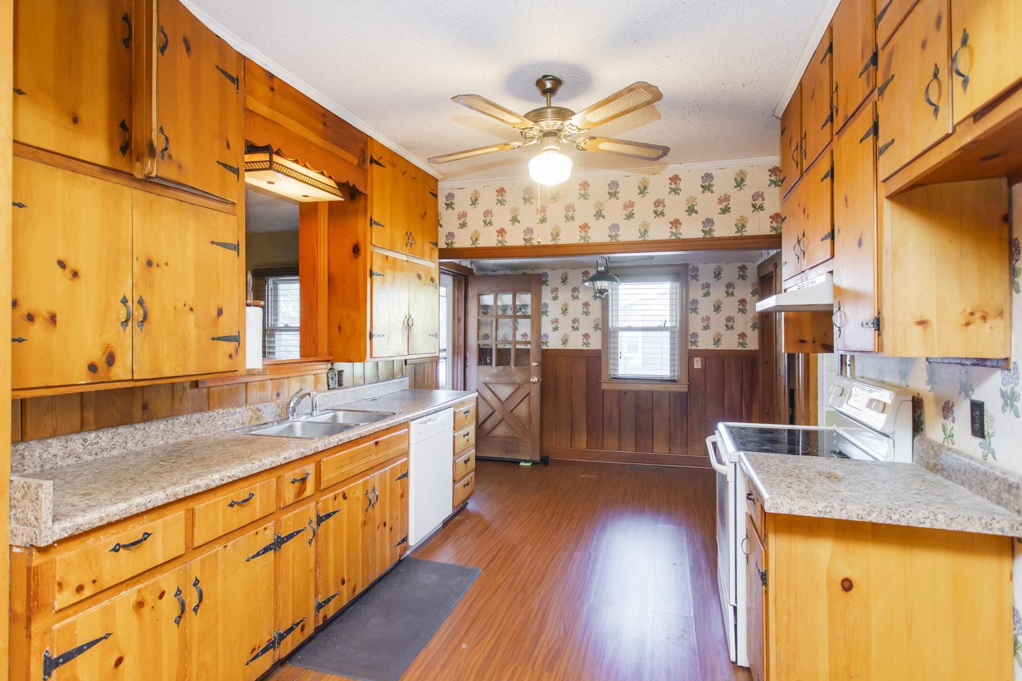 1700 Riverside Road Old Hickory, TN 37138 - Photo 9 of 59 a large kitchen with a lot of counter space and wooden floor