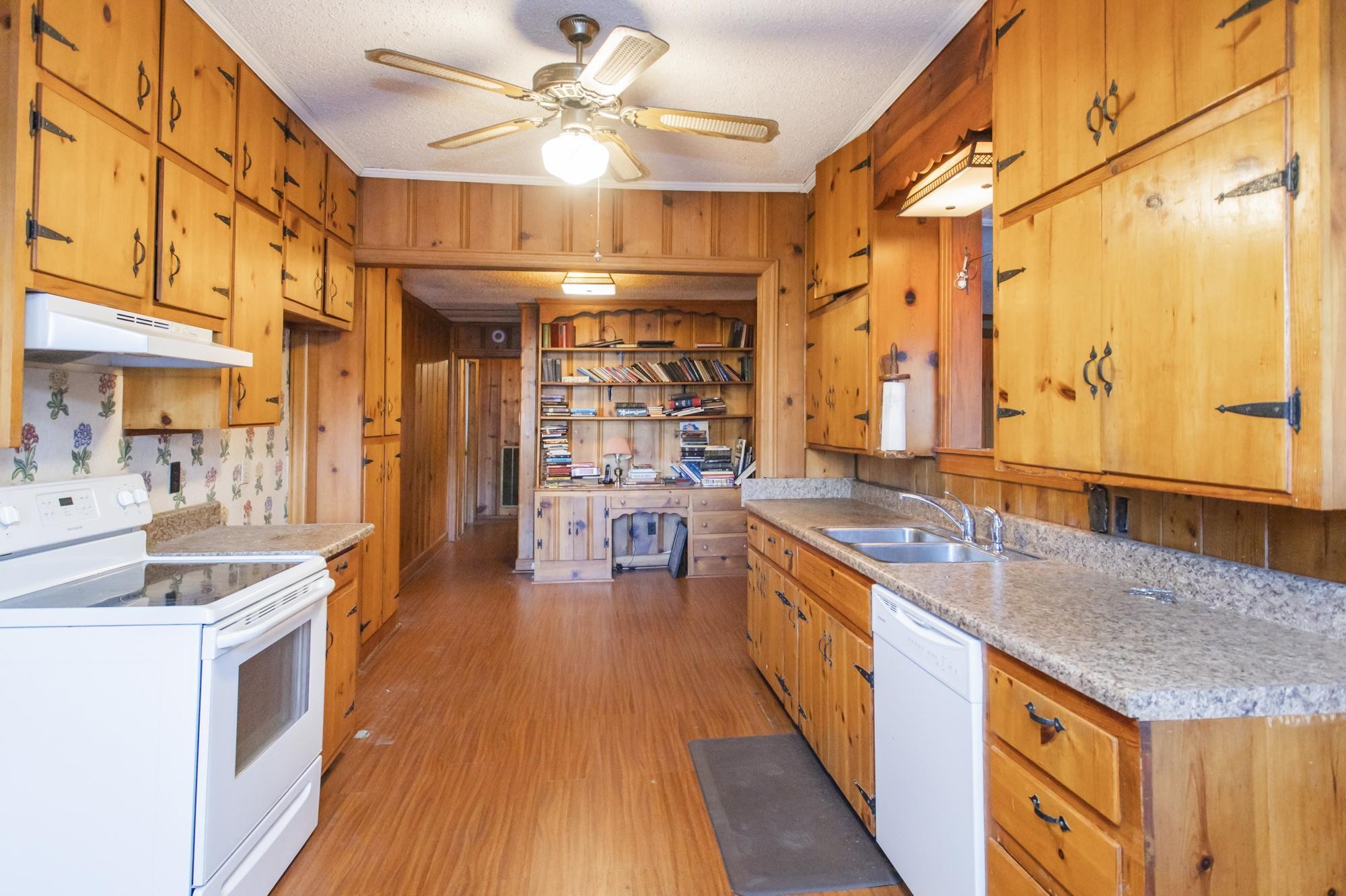 1700 Riverside Road Old Hickory, TN 37138 - Photo 10 of 59 a kitchen with stainless steel appliances granite countertop a sink and wooden cabinets