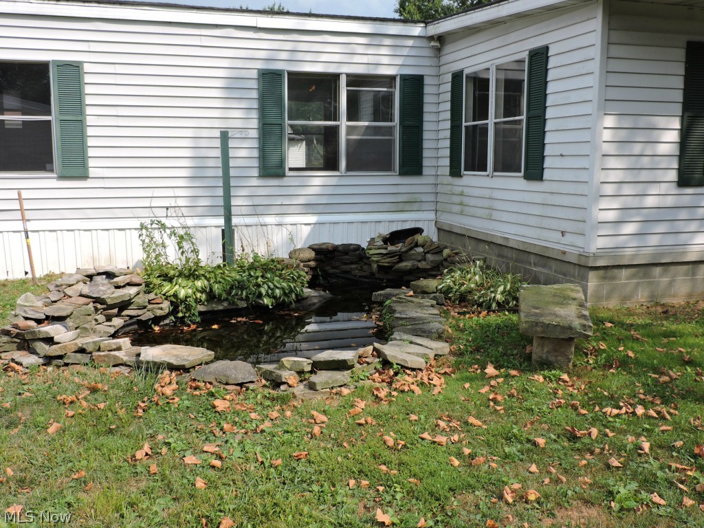 688 Fox Lake Road Wooster, OH 44691 - Photo 4 of 16 Enjoy sitting by the pond
