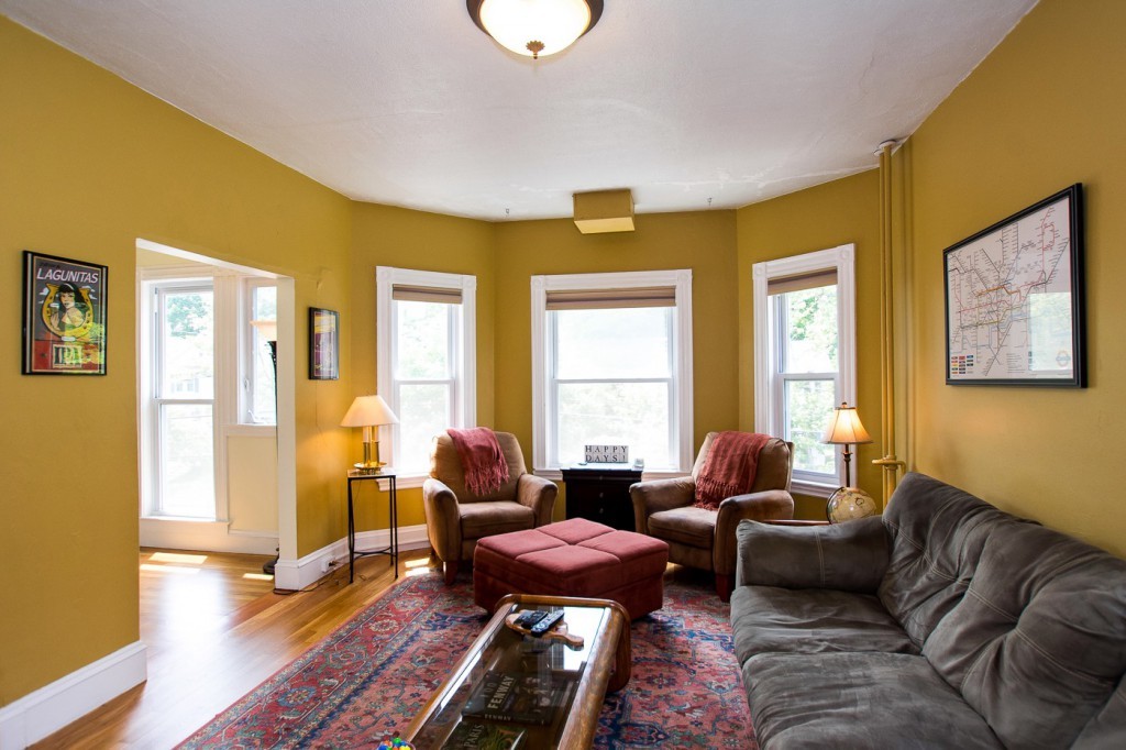 228 Langley Road Newton, MA 02459 - Photo 15 of 30 a living room with furniture and wooden floor