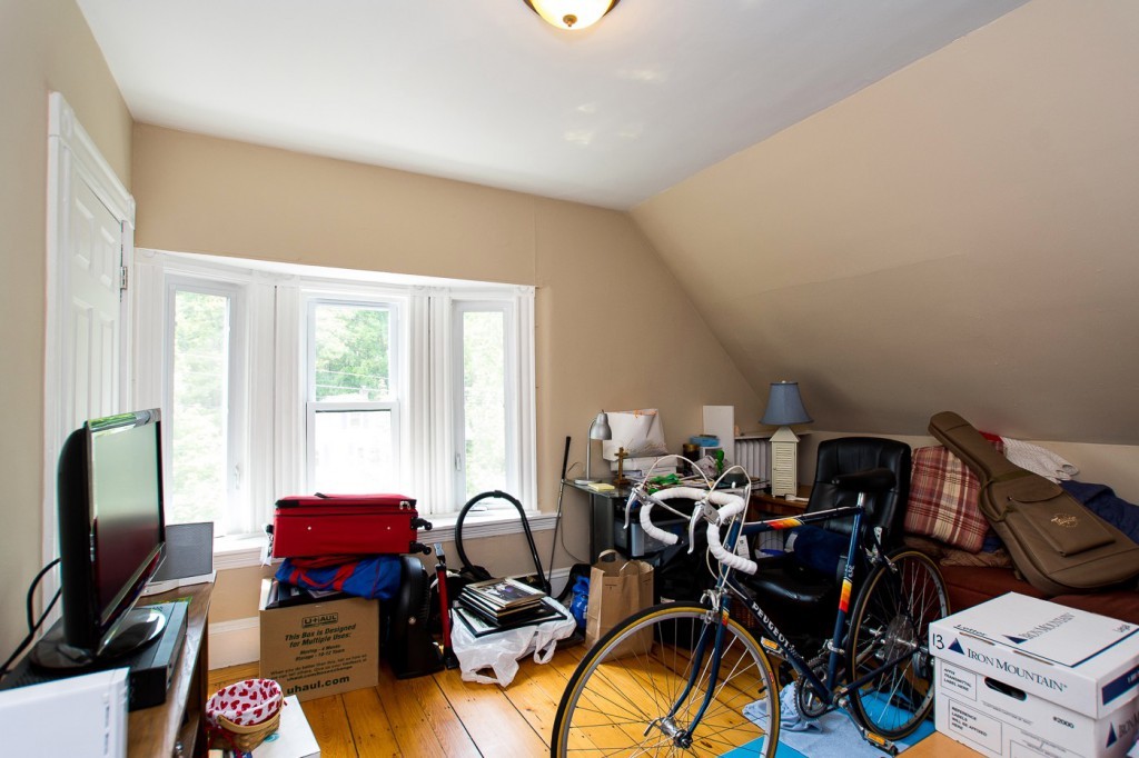 228 Langley Road Newton, MA 02459 - Photo 25 of 30 a view of a workspace with furniture and a window