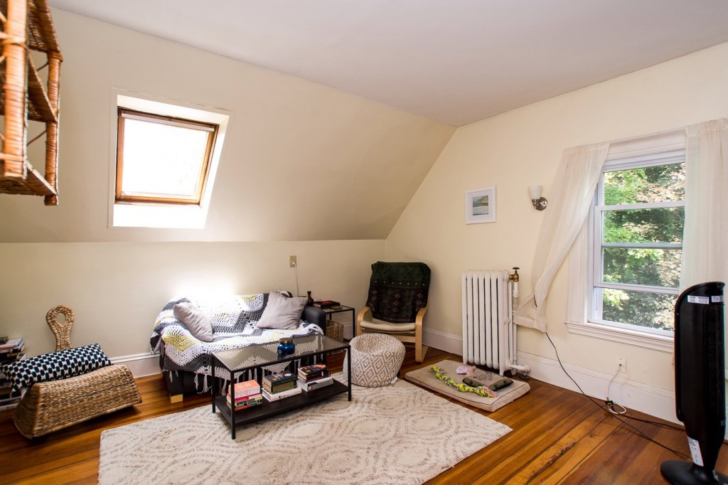 228 Langley Road Newton, MA 02459 - Photo 26 of 30 a bedroom with furniture and a window