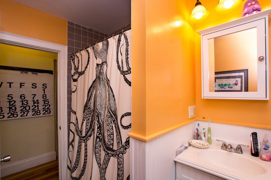 228 Langley Road Newton, MA 02459 - Photo 9 of 30 a view of walk in closet with clothes and shoes