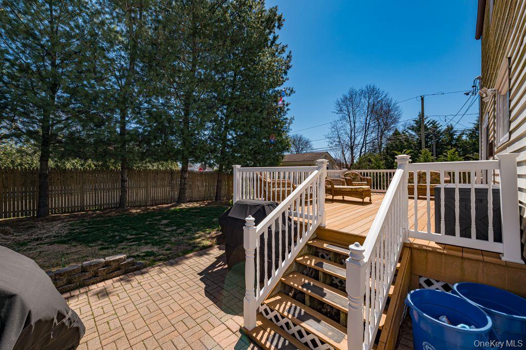 89 Cheltenham Road West Babylon, NY 11704 - Photo 20 of 26 a view of an outdoor sitting area with backyard
