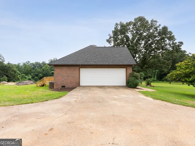 a view of a porch with wooden floor