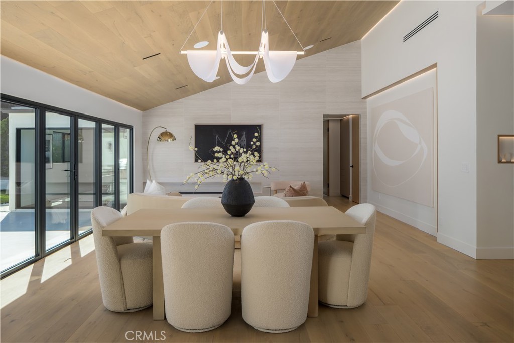 a dining room with large window