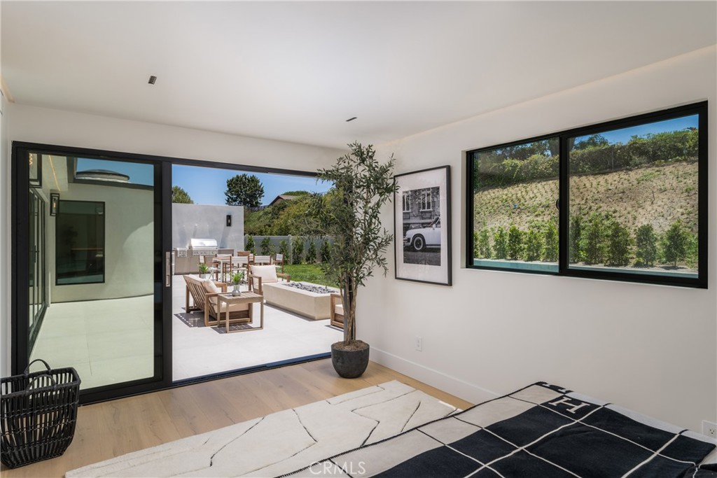 5826 Soledad Mountain Road La Jolla, CA 92037 - Photo 29 of 52 a view of livingroom with furniture and floor to ceiling window