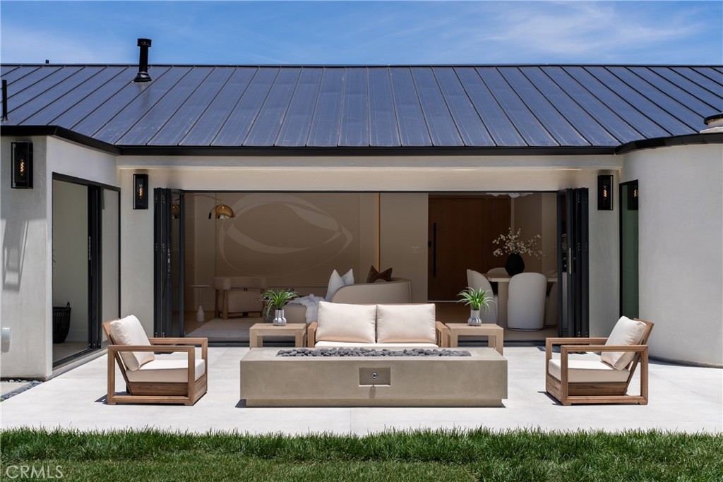 5826 Soledad Mountain Road La Jolla, CA 92037 - Photo 35 of 52 a living room with furniture and a window