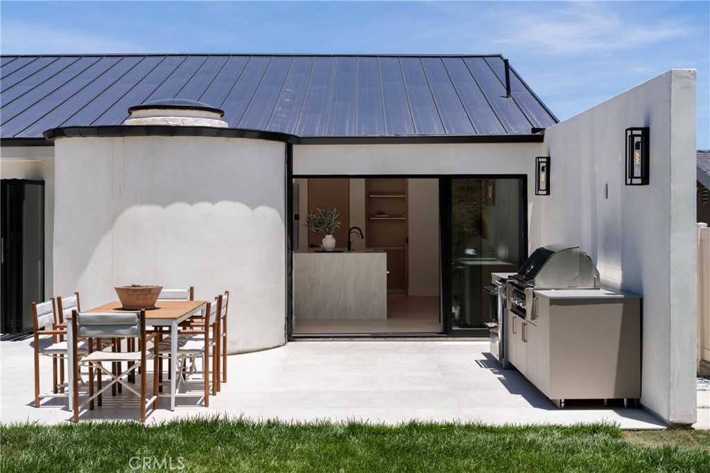 5826 Soledad Mountain Road La Jolla, CA 92037 - Photo 37 of 52 a living room filled with furniture and a table