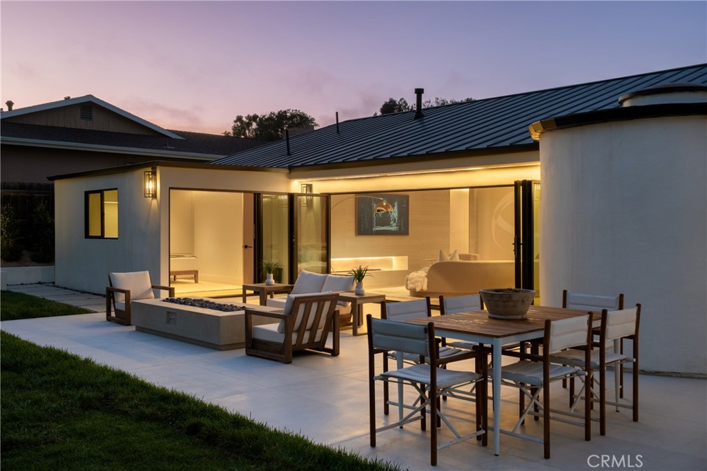 5826 Soledad Mountain Road La Jolla, CA 92037 - Photo 39 of 52 a backyard of a house with outdoor seating