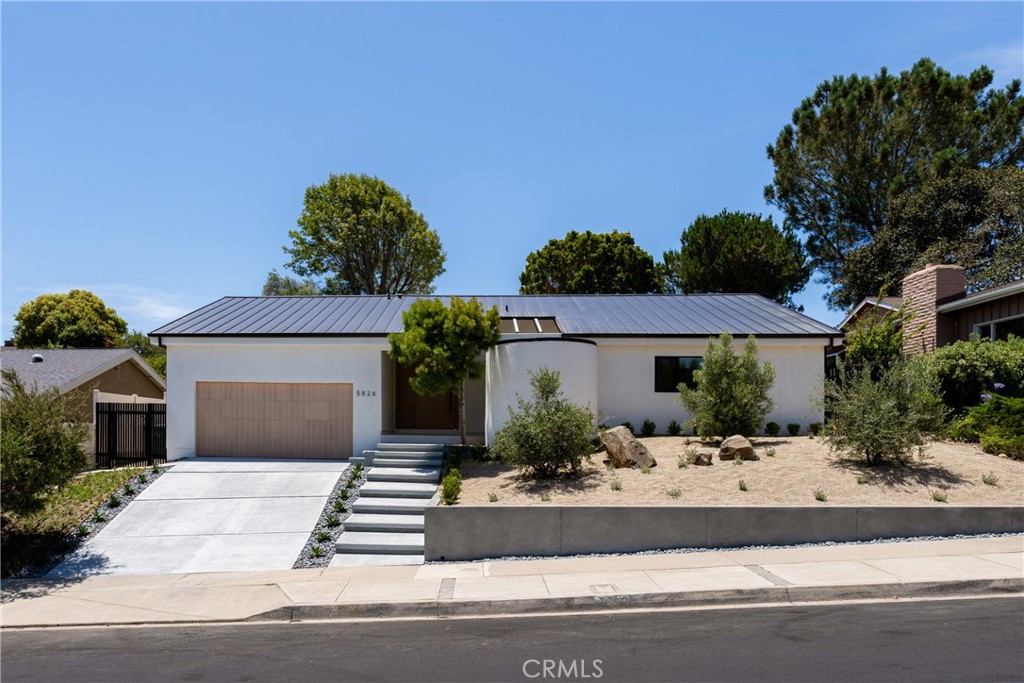 5826 Soledad Mountain Road La Jolla, CA 92037 - Photo 51 of 52 front view of a house with a yard