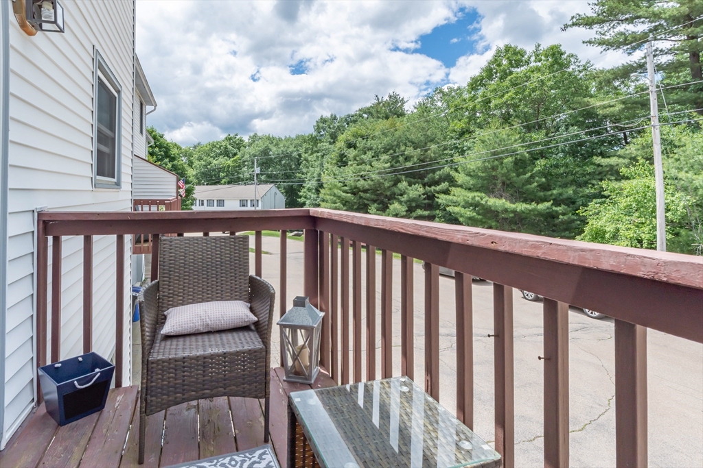 30 Lochmere Lane, Unit 30 Nashua, NH 03063 - Photo 7 of 19 a view of roof deck with patio
