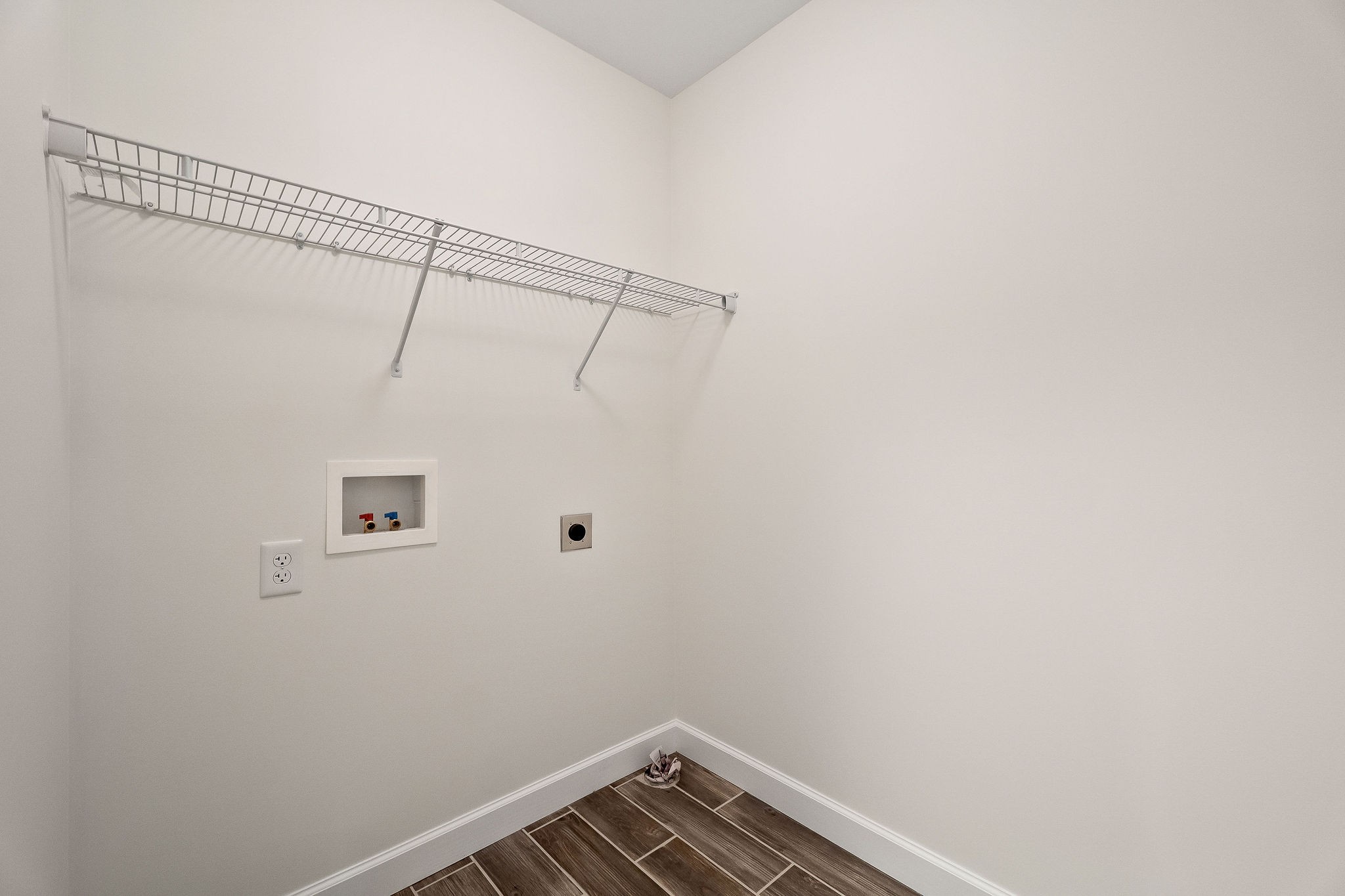 7060 Ditty Road Cookeville, TN 38506 - Photo 23 of 35 a view of a room with racks on the wall