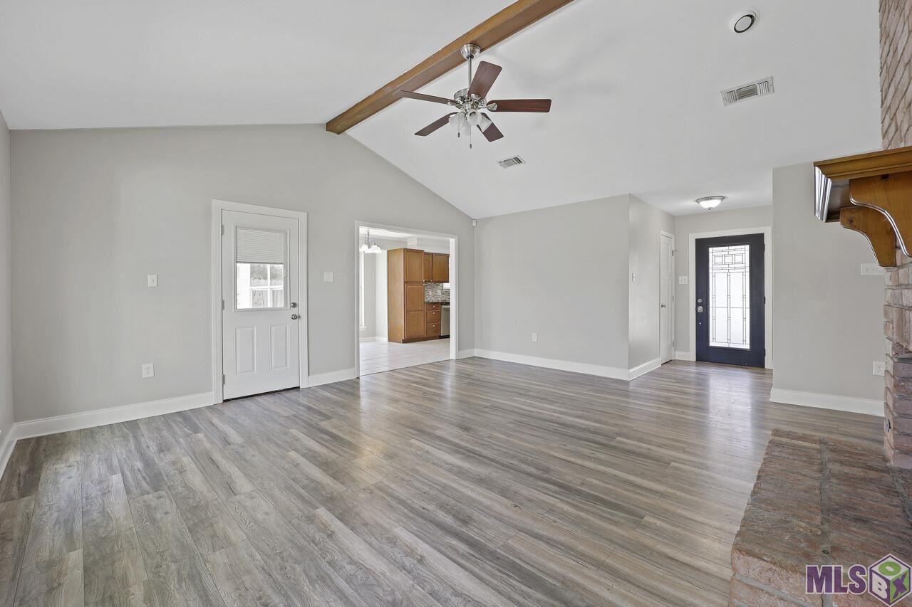 15029 Profit Avenue Baton Rouge, LA 70817 - Photo 8 of 18 Living to entry and kitchen