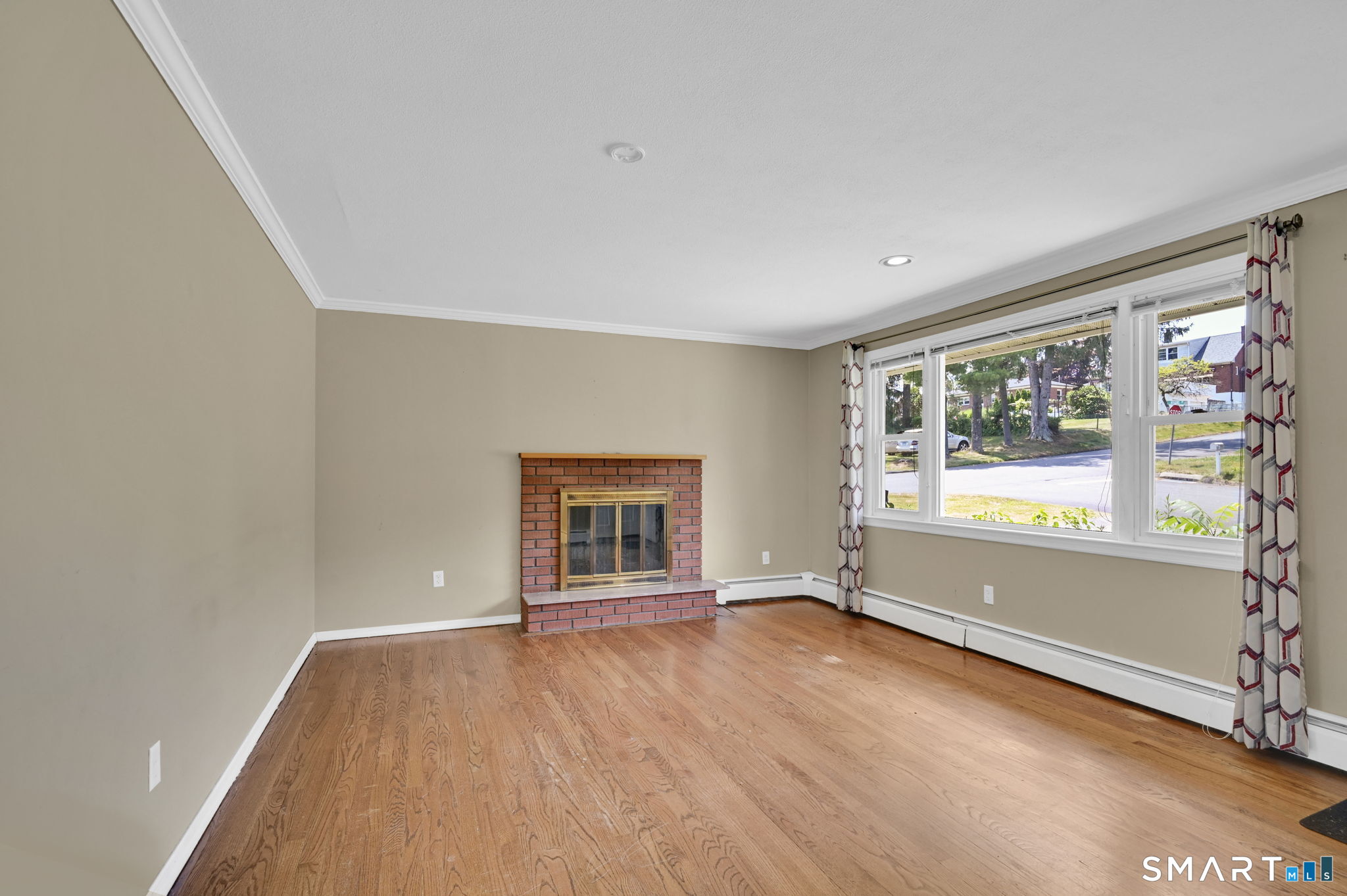 7 Rogers Drive Meriden, CT 06450 - Photo 10 of 40 wooden floor in an empty room with a window