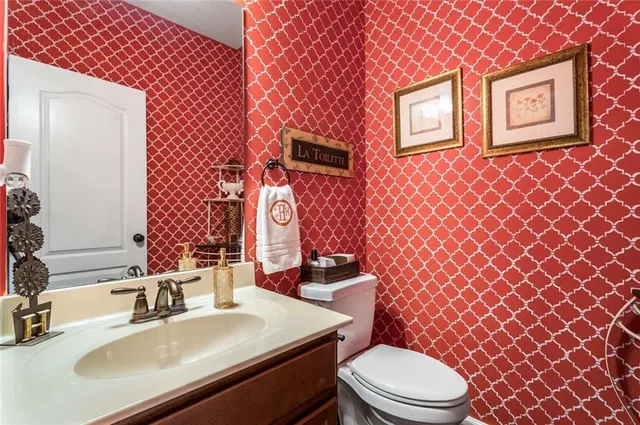 a bathroom with a sink and a toilet