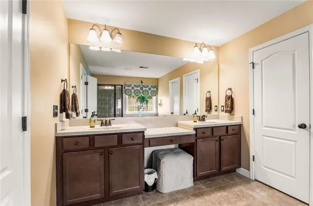 a kitchen with a sink and cabinets