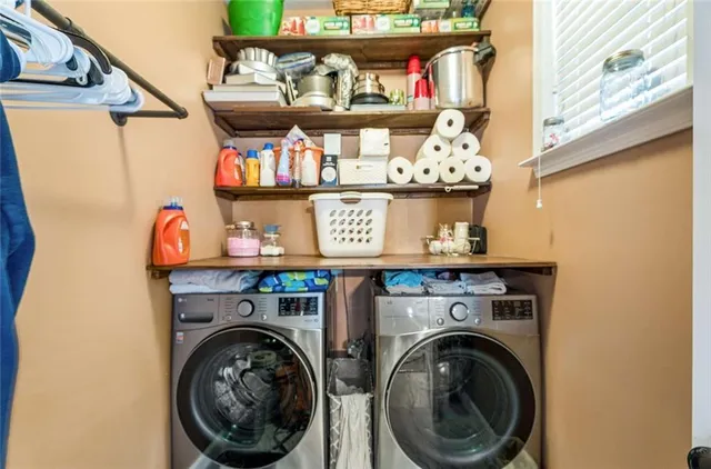 a utility room with dryer and washer
