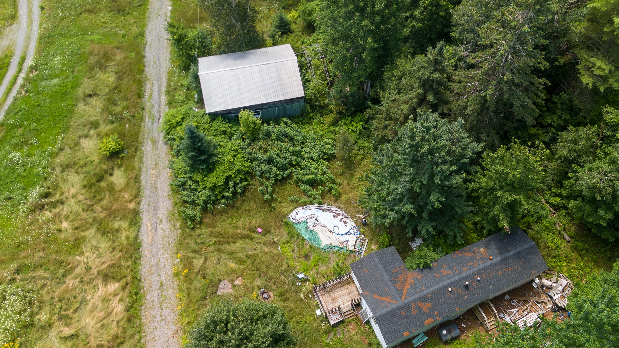 407 A Milo Road Sebec, ME 04481 - Photo 32 of 63 DJI_20240718114936_0377_D