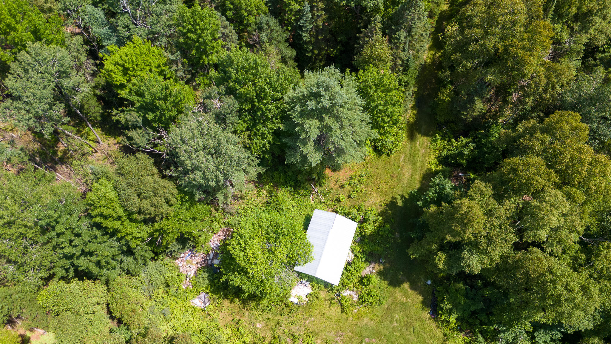 407 A Milo Road Sebec, ME 04481 - Photo 4 of 63 DJI_20240718120318_0425_D