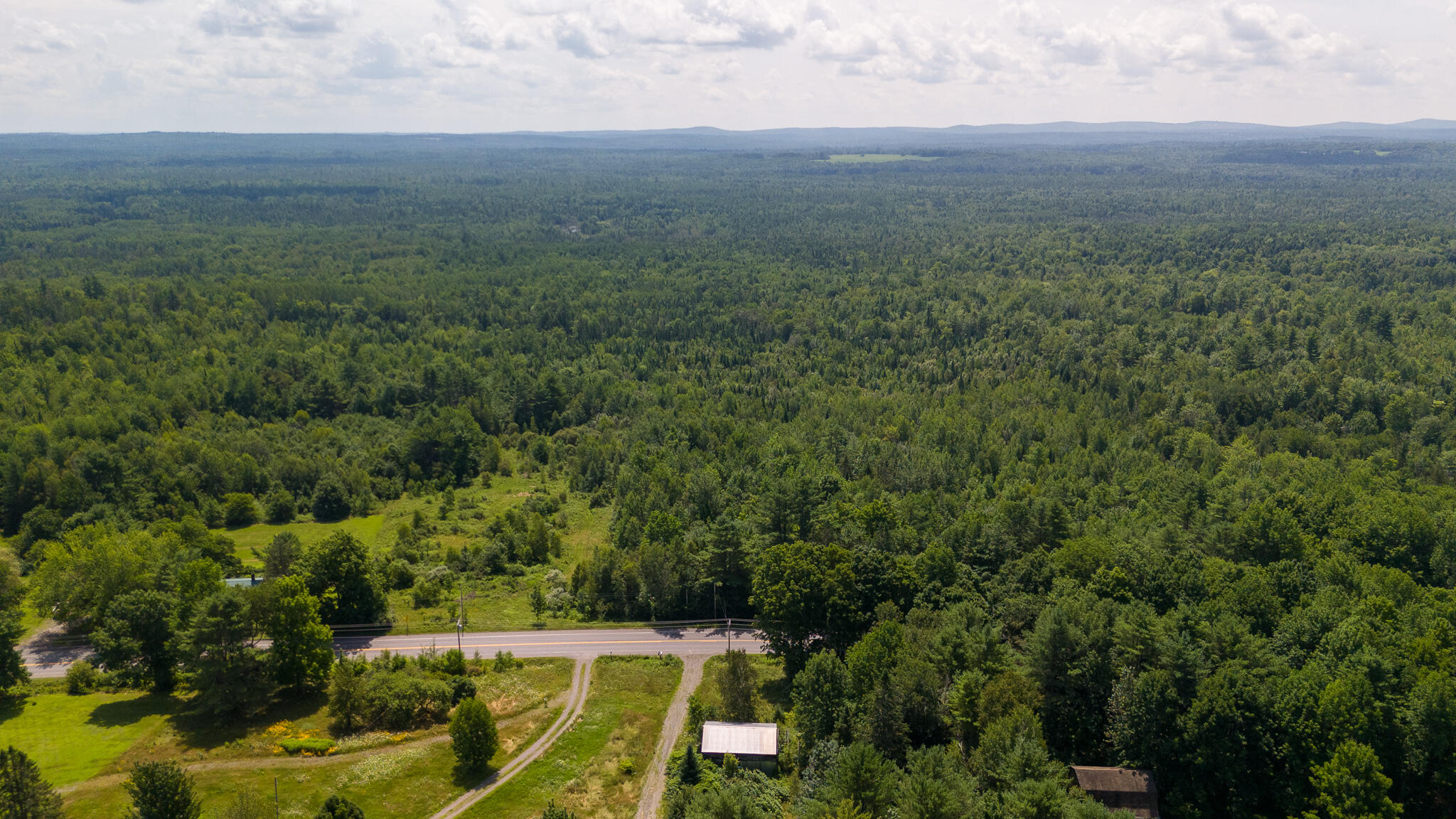 407 A Milo Road Sebec, ME 04481 - Photo 44 of 63 DJI_20240718115444_0401_D