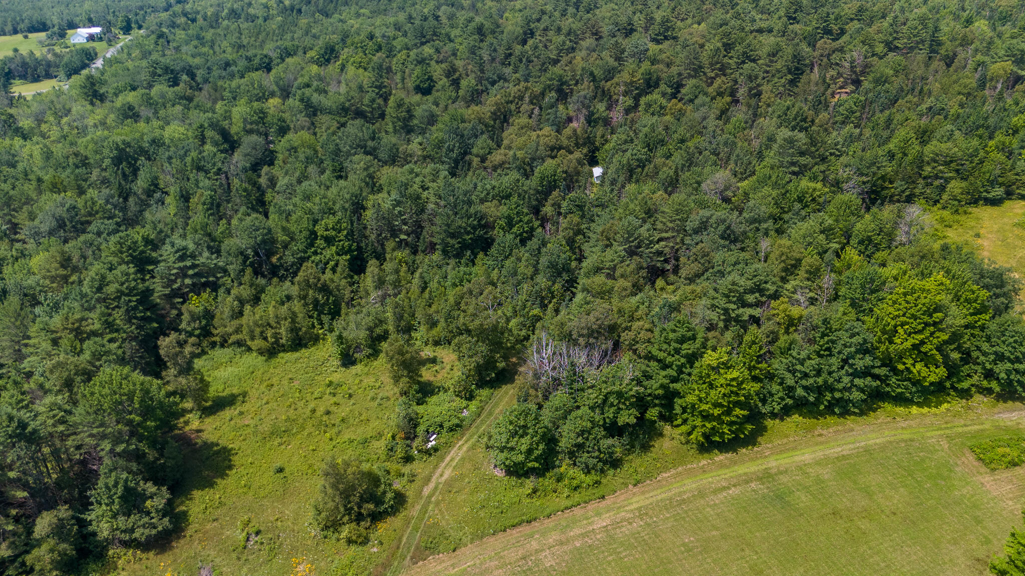 407 A Milo Road Sebec, ME 04481 - Photo 46 of 63 DJI_20240718115520_0403_D