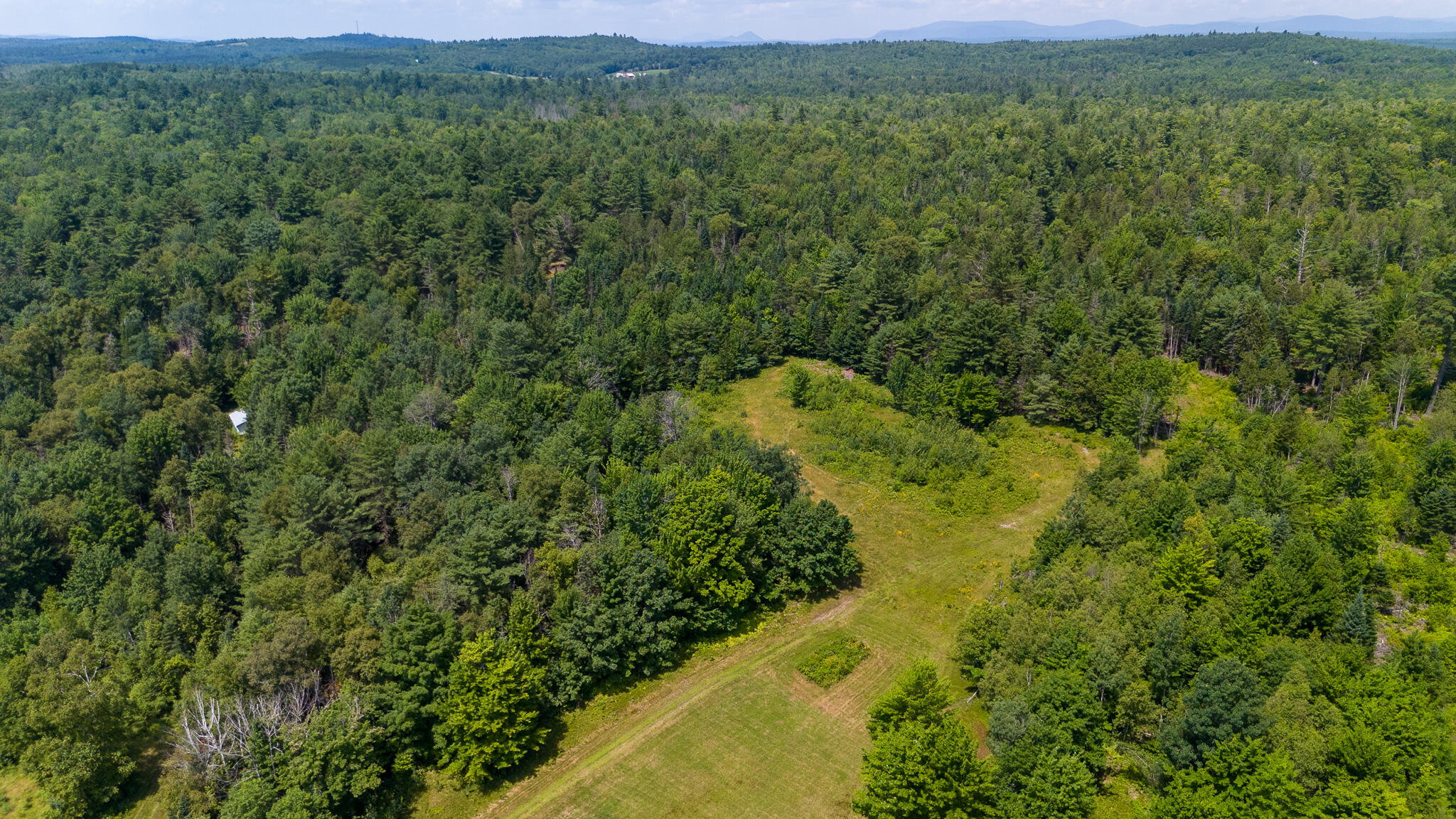 407 A Milo Road Sebec, ME 04481 - Photo 47 of 63 DJI_20240718115524_0404_D