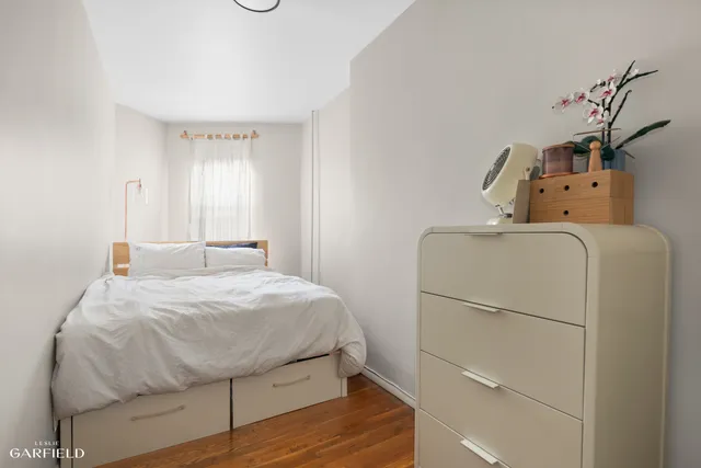 a view of a lobby with a couch and chairs