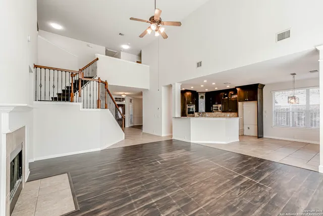 a view interior of a house an entryway and fire place