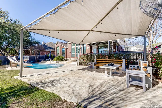a view of a chairs and tables in the patio
