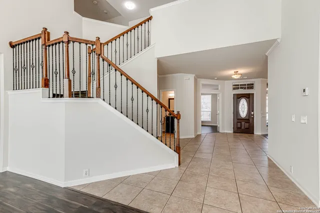 a view of a hallway with staircase