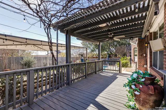 a view of a balcony with furniture