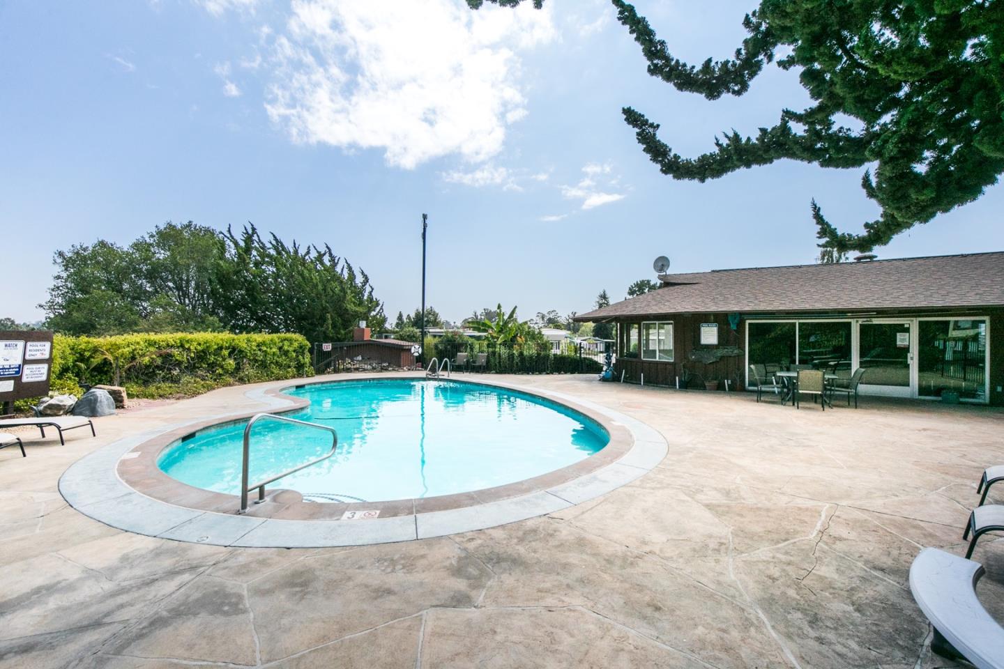 4300 Soquel Drive, Unit 15 Soquel, CA 95073 - Photo 14 of 15 a view of a swimming pool with a yard