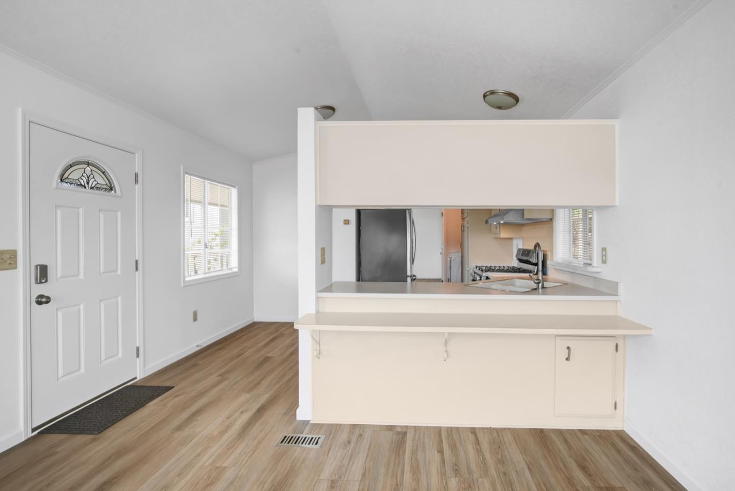 4300 Soquel Drive, Unit 15 Soquel, CA 95073 - Photo 6 of 15 a living room with a wooden floor