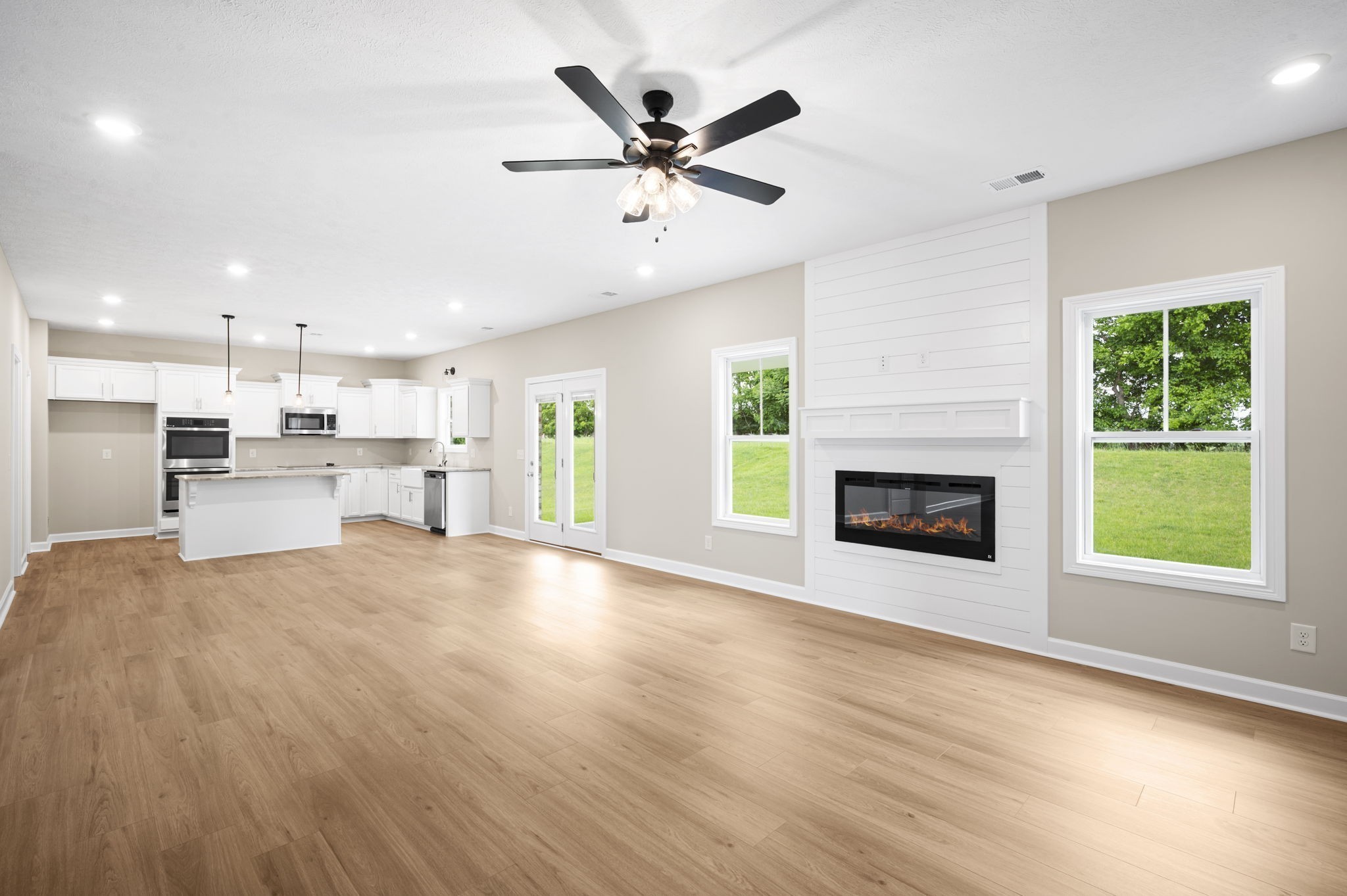 439 Blue Ridge Clarksville, TN 37043 - Photo 11 of 47 a view of an empty room with a kitchen and a window
