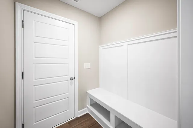 a bathroom with a shower and a sink