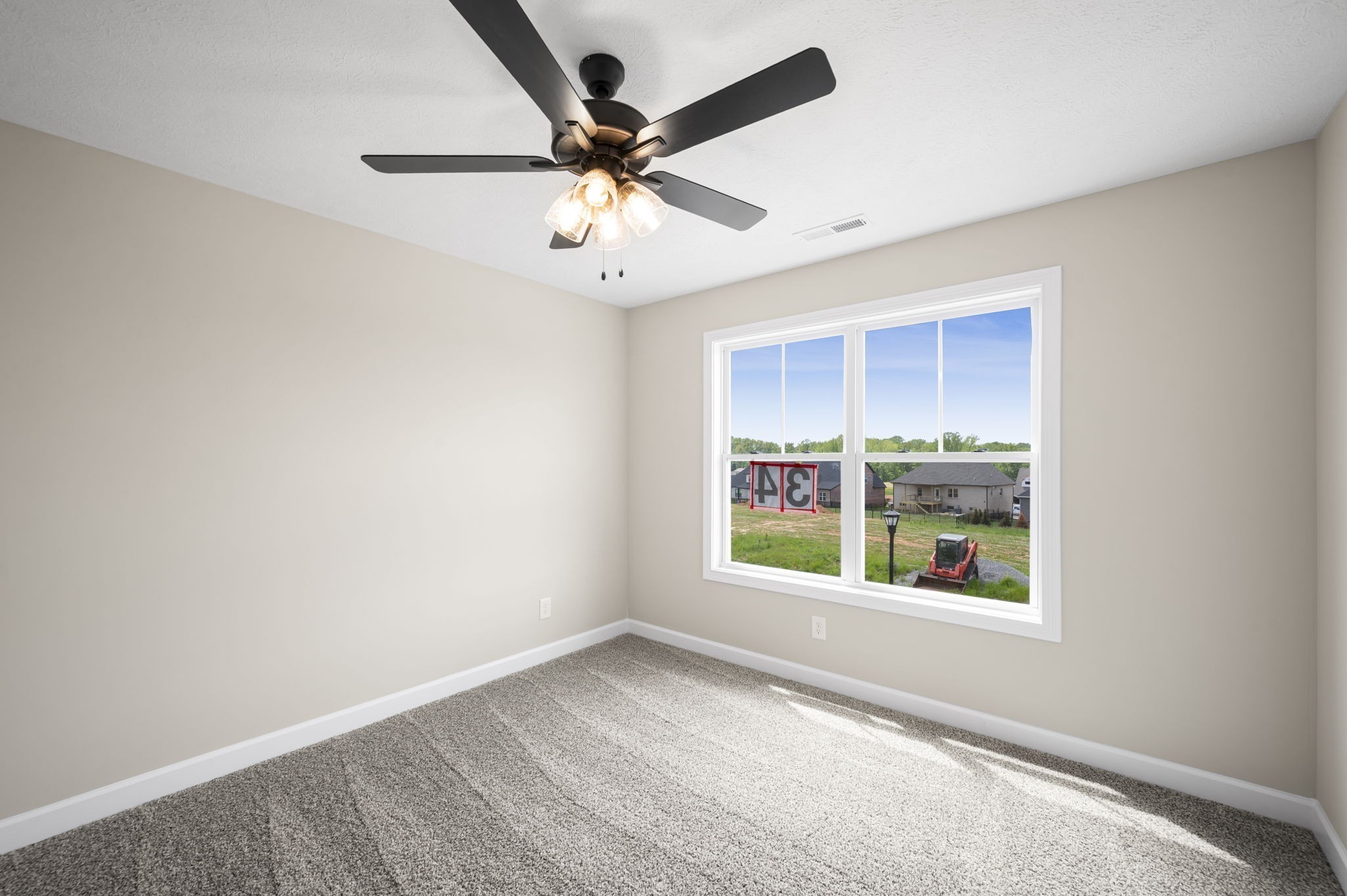 439 Blue Ridge Clarksville, TN 37043 - Photo 26 of 47 an empty room with windows and ceiling fan