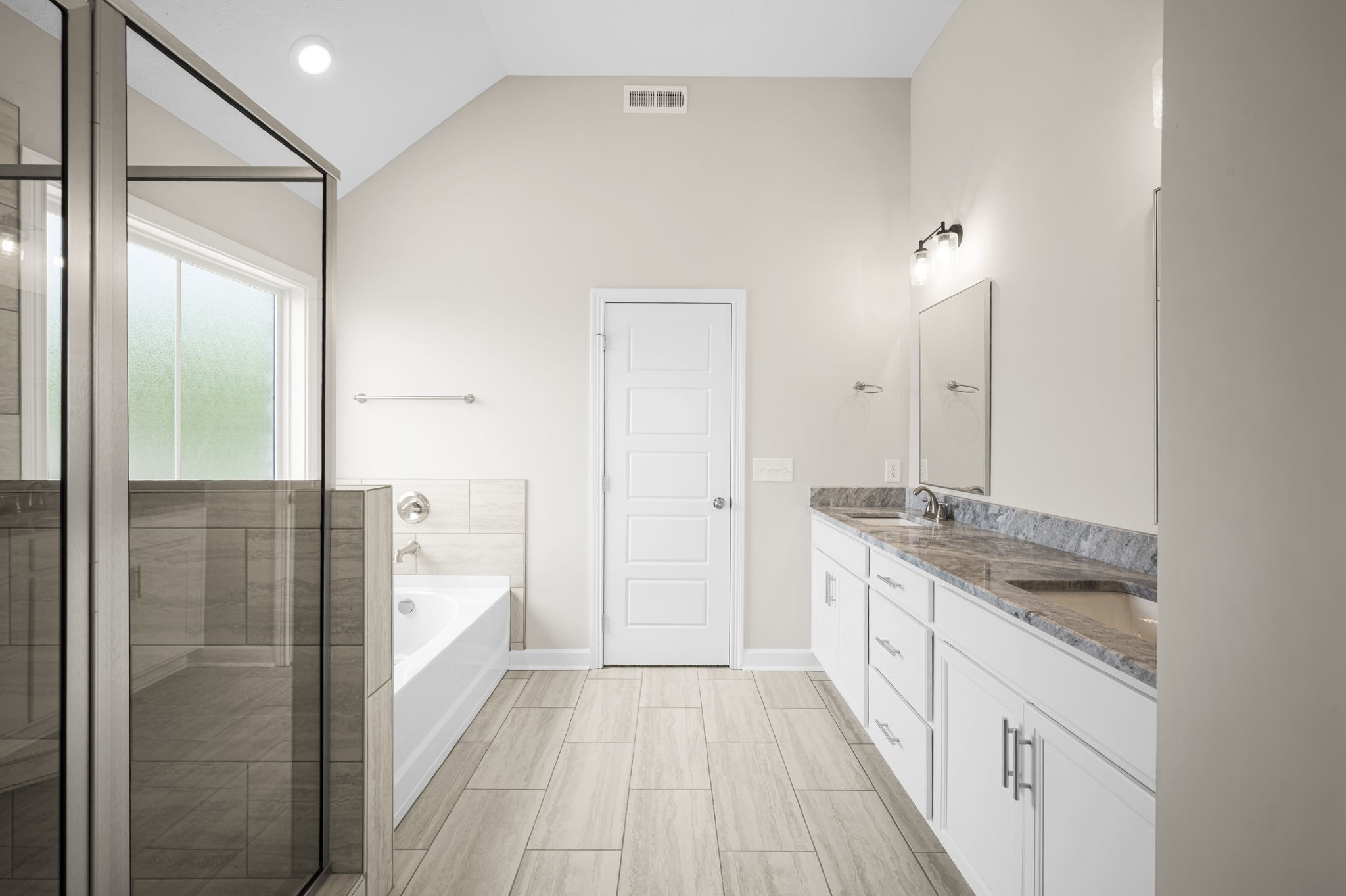 439 Blue Ridge Clarksville, TN 37043 - Photo 40 of 47 a spacious bathroom with a granite countertop sink a mirror and a shower