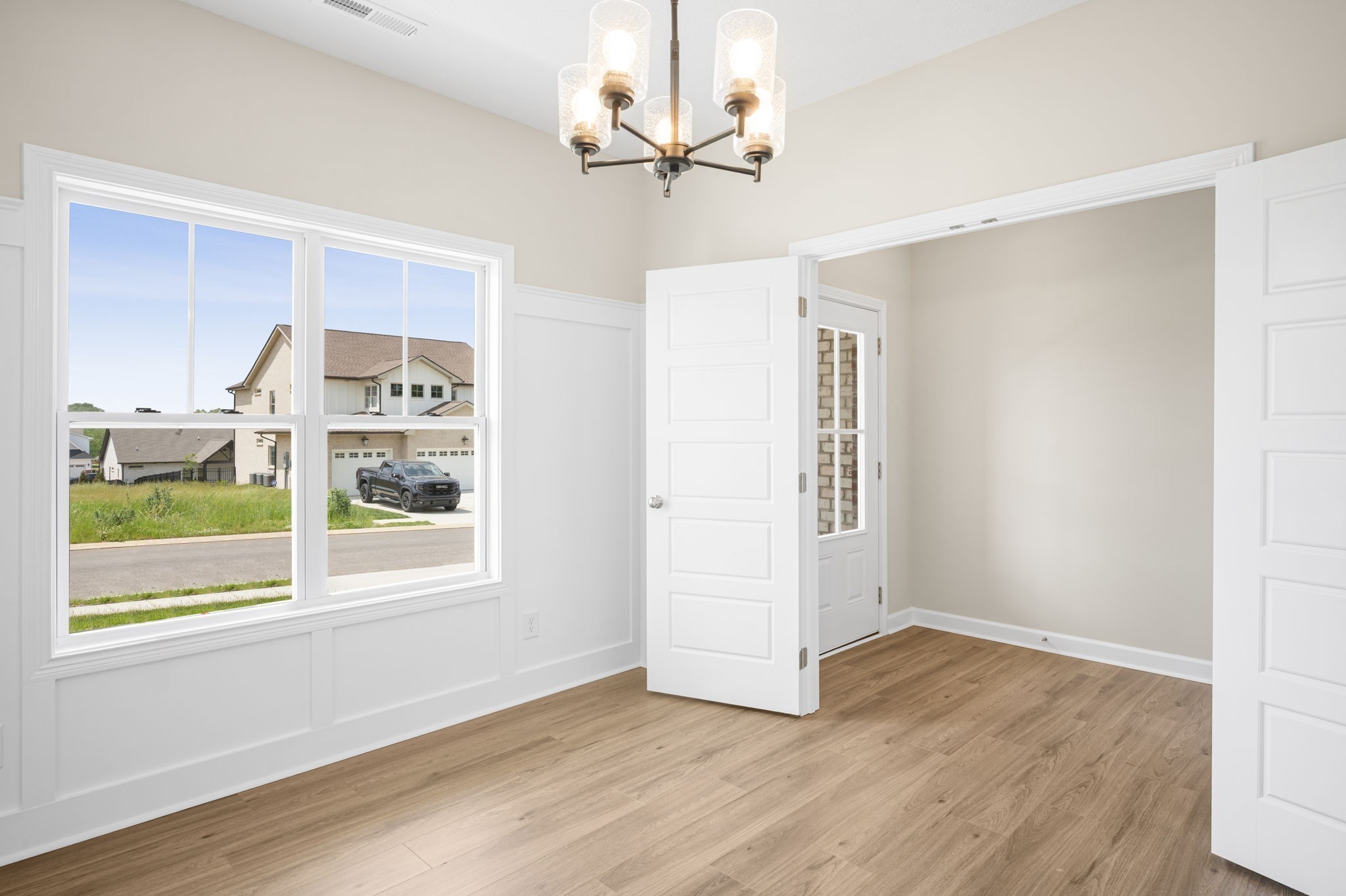 439 Blue Ridge Clarksville, TN 37043 - Photo 4 of 47 a view of an empty room with a window and wooden floor