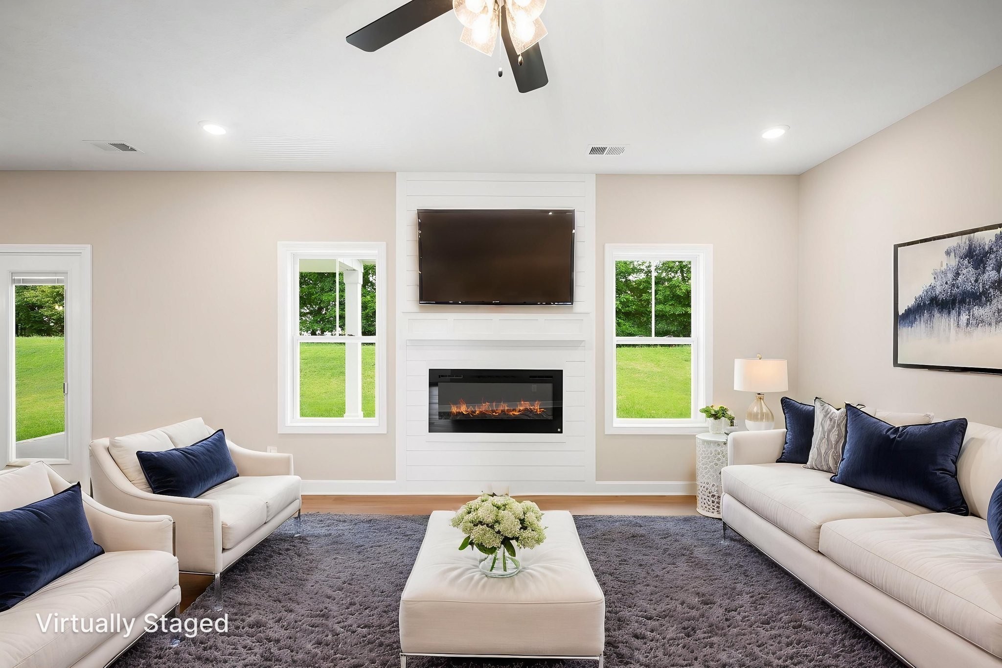 439 Blue Ridge Clarksville, TN 37043 - Photo 10 of 47 a living room with furniture a flat screen tv and a fireplace