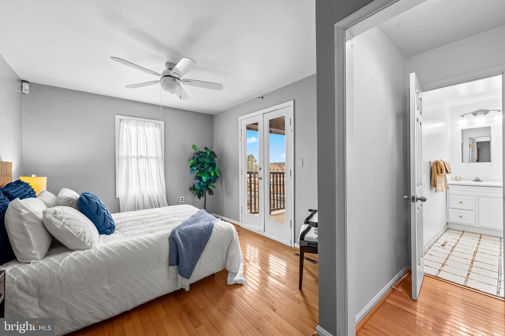 4202 Roland Avenue, Unit 208 Roland Park, MD 21211 - Photo 27 of 41 Rear bedroom with sunset views