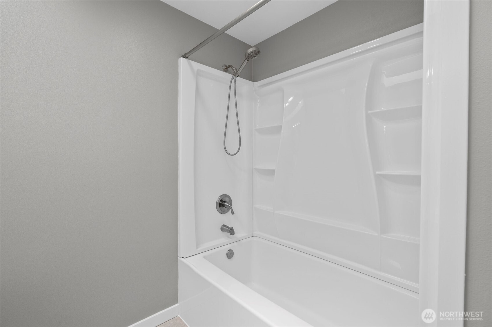 201 Schmid Street Enumclaw, WA 98022 - Photo 26 of 40 a bathroom with a shower and a bath tub