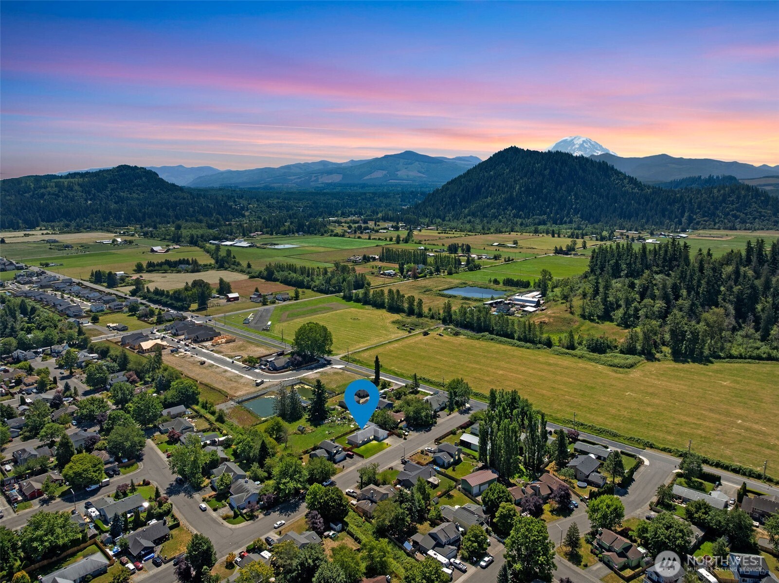 201 Schmid Street Enumclaw, WA 98022 - Photo 40 of 40 a view of a city with mountains in the background