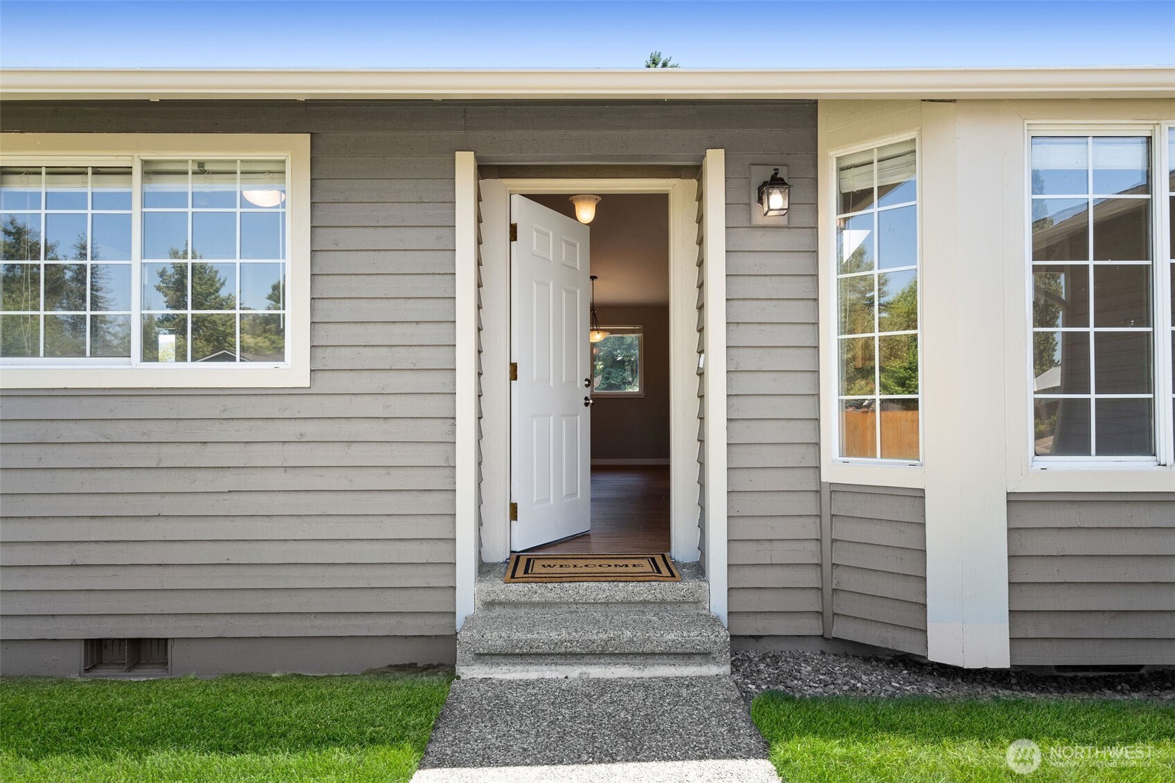201 Schmid Street Enumclaw, WA 98022 - Photo 6 of 40 a front view of a house with a yard