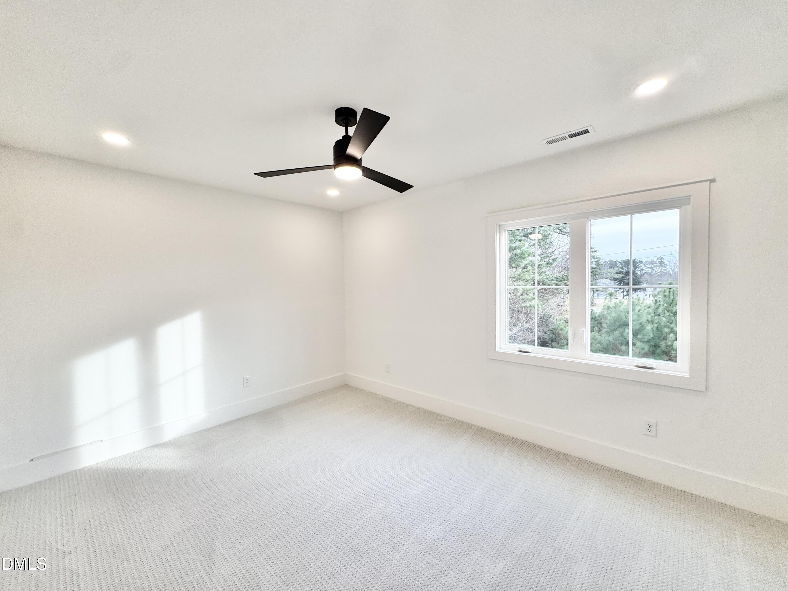 8012 Penny Road Raleigh, NC 27606 - Photo 46 of 83 an empty room with a window