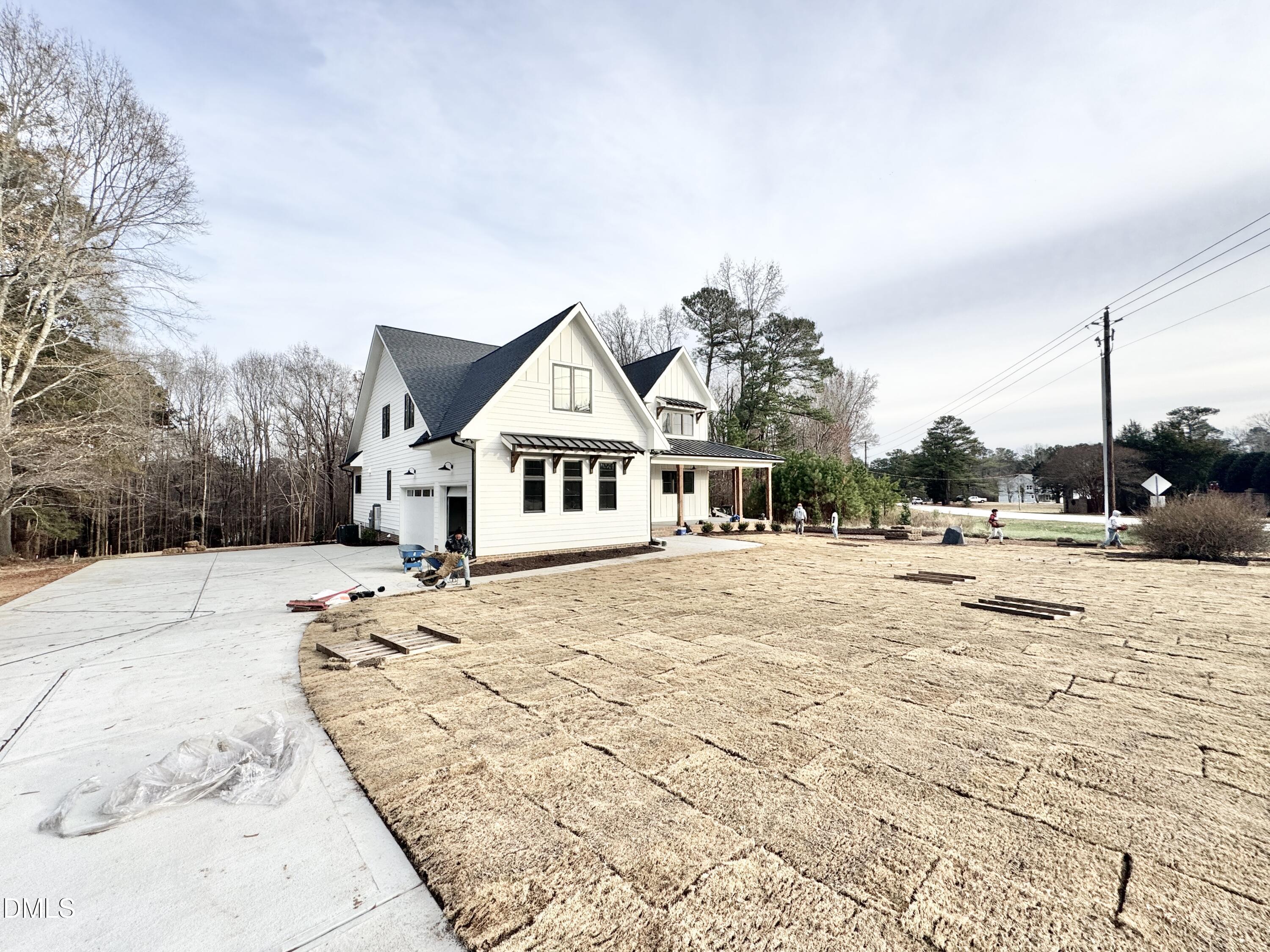 8012 Penny Road Raleigh, NC 27606 - Photo 72 of 83 a view of a house with snow on the background