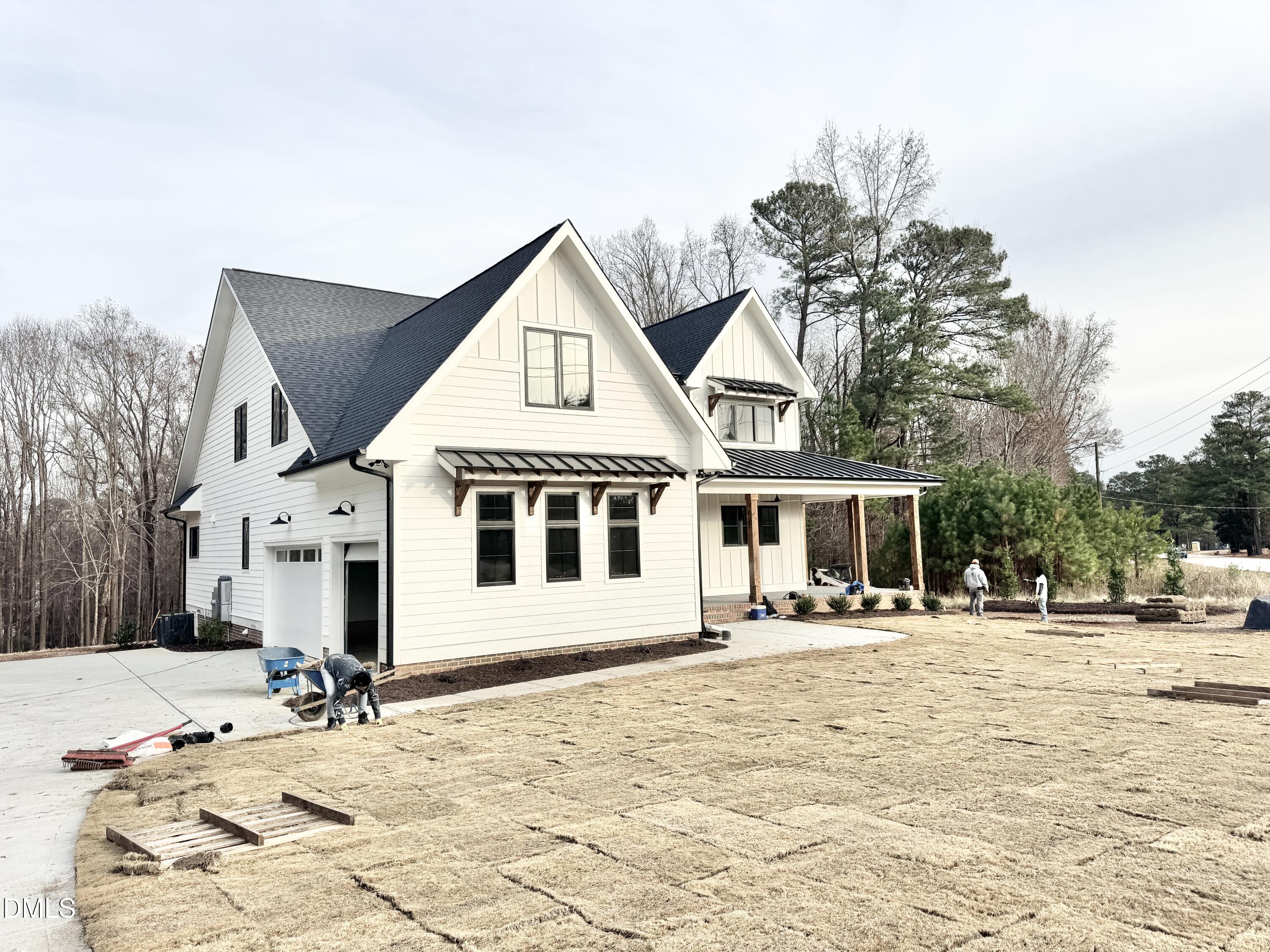 8012 Penny Road Raleigh, NC 27606 - Photo 73 of 83 a front view of a house with snow on the background