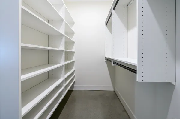 a view of an empty walk in closet